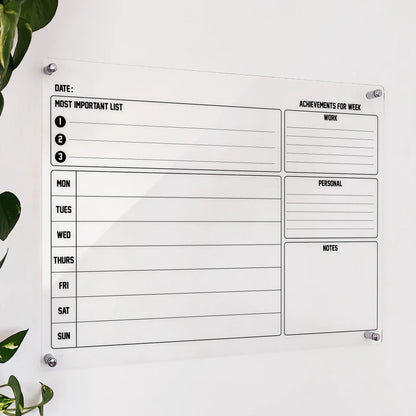 Clear acrylic weekly planner with most-important-list, weekday rows, work/personal achievements, and notes