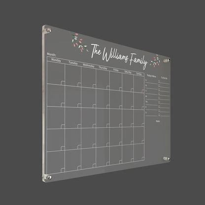 3D render of the floral personalized family acrylic calendar with silver standoff hardware on a dark background