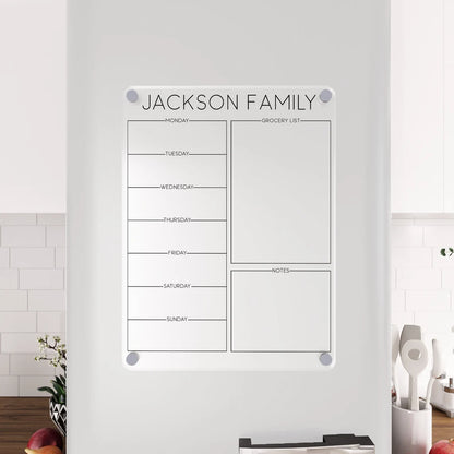 Personalized clear acrylic 'Jackson Family' magnetic fridge planner with grocery list and notes, on a white fridge