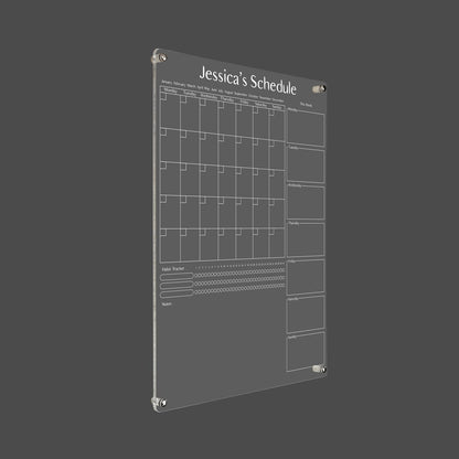 3D render of the personalized monthly/weekly acrylic planner with silver standoff hardware on a dark background