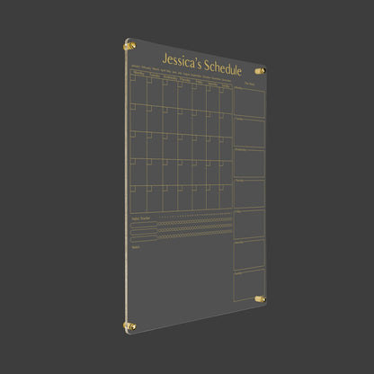 3D render of the personalized monthly/weekly acrylic planner with gold standoff hardware on a dark background