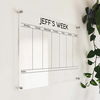 Personalized clear acrylic 'Jeff's Week' planner with bold title, 7 day columns, and a notes strip