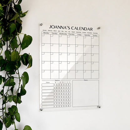 Personalized clear acrylic 'Joanna's Calendar' with monthly grid, weekday chore tracker, and notes section