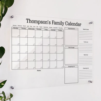 Personalized clear acrylic 'Thompson's Family Calendar' with appointments, shopping list, goals, and chore sections
